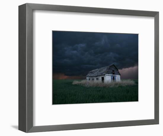 Old Barn Stands in a Wheat Field as a Thunderstorm Passes in the Distance Near Ogallah, Kansas-null-Framed Photographic Print