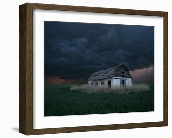 Old Barn Stands in a Wheat Field as a Thunderstorm Passes in the Distance Near Ogallah, Kansas-null-Framed Photographic Print