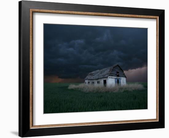 Old Barn Stands in a Wheat Field as a Thunderstorm Passes in the Distance Near Ogallah, Kansas-null-Framed Photographic Print