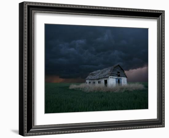 Old Barn Stands in a Wheat Field as a Thunderstorm Passes in the Distance Near Ogallah, Kansas-null-Framed Photographic Print