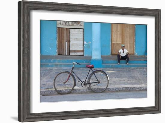 Old Bicycle Propped Up Outside Old Building with Local Man on Steps-Lee Frost-Framed Photographic Print