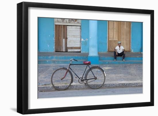 Old Bicycle Propped Up Outside Old Building with Local Man on Steps-Lee Frost-Framed Photographic Print