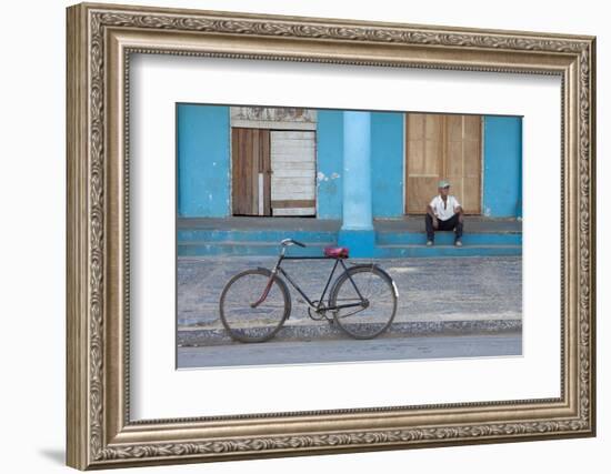 Old Bicycle Propped Up Outside Old Building with Local Man on Steps-Lee Frost-Framed Photographic Print