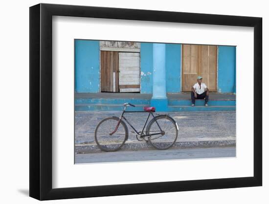 Old Bicycle Propped Up Outside Old Building with Local Man on Steps-Lee Frost-Framed Photographic Print