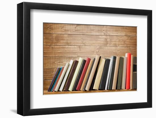 Old Books On A Wooden Shelf. No Labels, Blank Spine-donatas1205-Framed Photographic Print