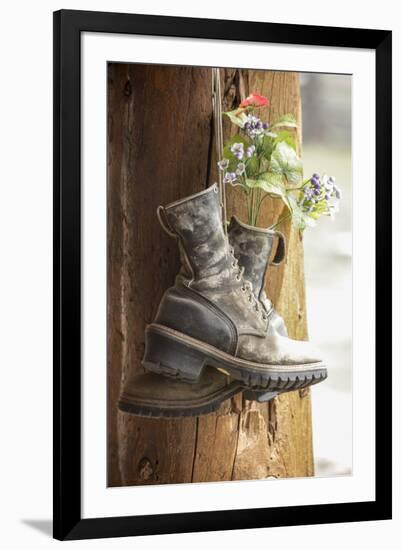 Old boots used a decoration, Pagosa Springs, Colorado, USA.-Julien McRoberts-Framed Photographic Print