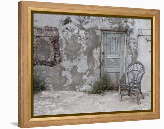 Old Building Chair and Doorway in Town of Oia, Santorini, Greece-Darrell Gulin-Framed Premier Image Canvas