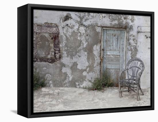 Old Building Chair and Doorway in Town of Oia, Santorini, Greece-Darrell Gulin-Framed Premier Image Canvas