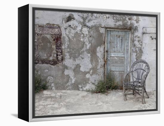 Old Building Chair and Doorway in Town of Oia, Santorini, Greece-Darrell Gulin-Framed Premier Image Canvas