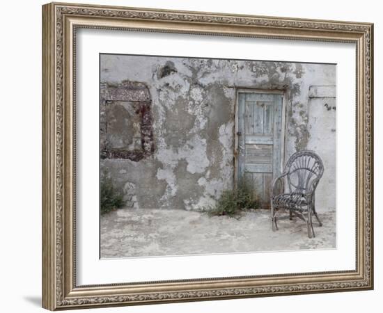 Old Building Chair and Doorway in Town of Oia, Santorini, Greece-Darrell Gulin-Framed Photographic Print