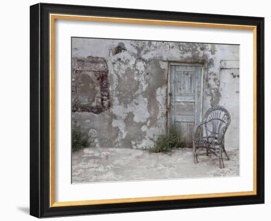 Old Building Chair and Doorway in Town of Oia, Santorini, Greece-Darrell Gulin-Framed Photographic Print