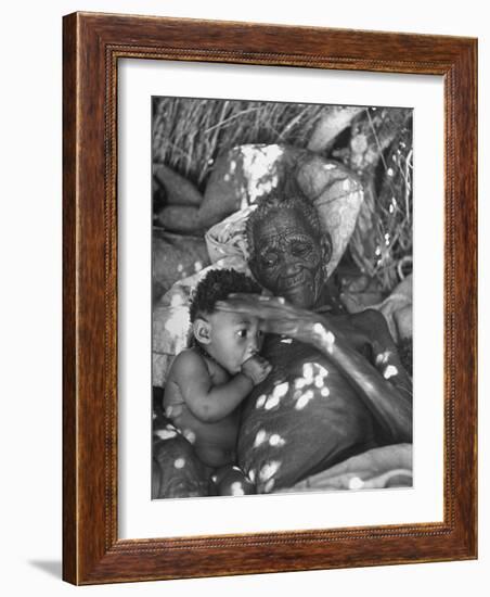 Old Bushman Woman Holding a Baby-null-Framed Photographic Print