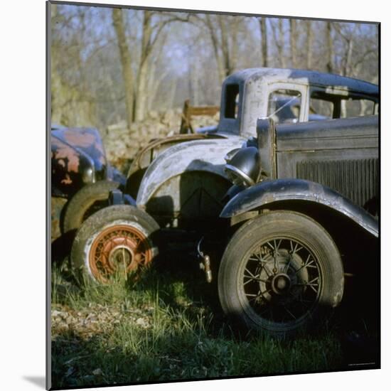 Old Cars in a Junk Yard-Walker Evans-Mounted Photographic Print