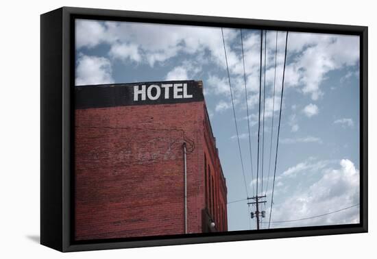 Old Dilapidated Brick Motel with Cloudy Sky-J D S-Framed Premier Image Canvas