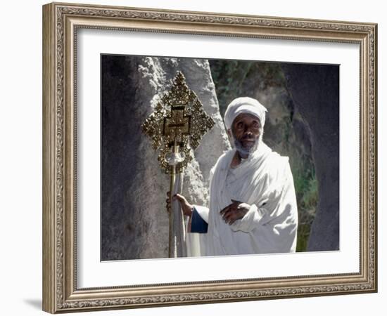 Old Ethiopian Orthodox Priest Holds a Large Brass Coptic Cross at Rock-Hewn Church of Adadi Maryam-Nigel Pavitt-Framed Photographic Print