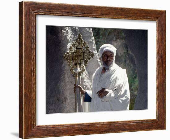Old Ethiopian Orthodox Priest Holds a Large Brass Coptic Cross at Rock-Hewn Church of Adadi Maryam-Nigel Pavitt-Framed Photographic Print