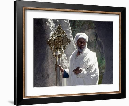 Old Ethiopian Orthodox Priest Holds a Large Brass Coptic Cross at Rock-Hewn Church of Adadi Maryam-Nigel Pavitt-Framed Photographic Print