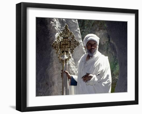 Old Ethiopian Orthodox Priest Holds a Large Brass Coptic Cross at Rock-Hewn Church of Adadi Maryam-Nigel Pavitt-Framed Photographic Print