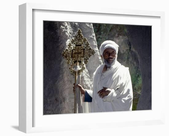 Old Ethiopian Orthodox Priest Holds a Large Brass Coptic Cross at Rock-Hewn Church of Adadi Maryam-Nigel Pavitt-Framed Photographic Print