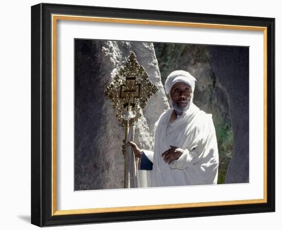 Old Ethiopian Orthodox Priest Holds a Large Brass Coptic Cross at Rock-Hewn Church of Adadi Maryam-Nigel Pavitt-Framed Photographic Print