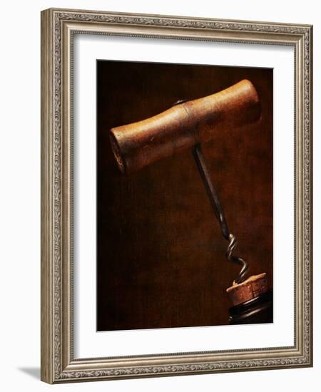 Old-Fashioned Corkscrew Uncorking Bottle-Steve Lupton-Framed Photographic Print