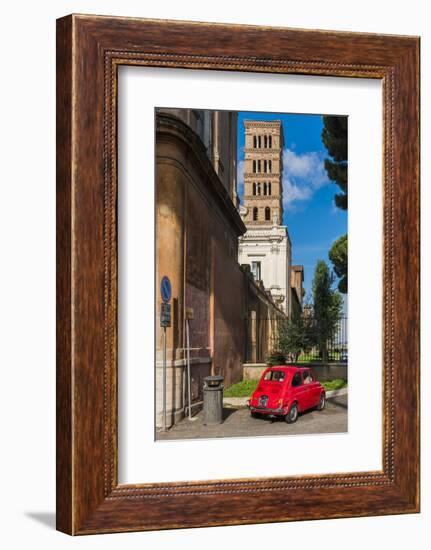 Old Fiat 500 car parked with Basilica dei Santi Bonifacio ed Alessio in the background, Rome, Lazio-Stefano Politi Markovina-Framed Photographic Print