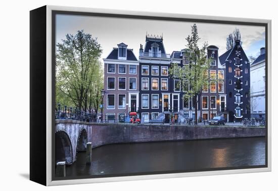 Old Gabled Houses Line the Keizersgracht Canal at Dusk, Amsterdam, Netherlands, Europe-Amanda Hall-Framed Premier Image Canvas
