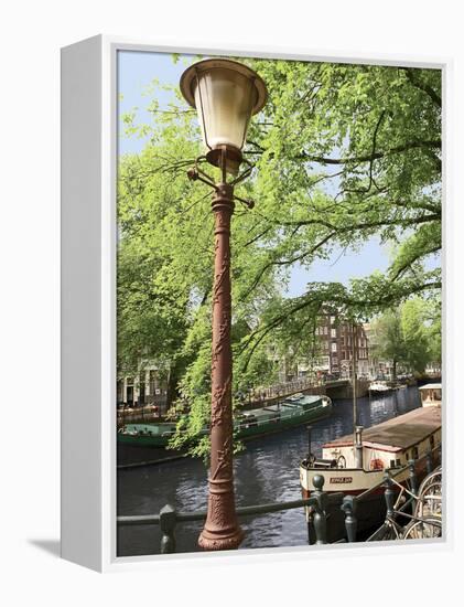 Old Gas Lamp Post and Bicycles on a Bridge over a Canal in Amsterdam, the Netherlands-Miva Stock-Framed Premier Image Canvas