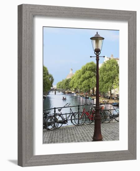 Old Gas Lamp Post and Bicycles on a Bridge over a Canal in Amsterdam, the Netherlands-Miva Stock-Framed Photographic Print