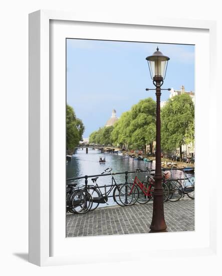 Old Gas Lamp Post and Bicycles on a Bridge over a Canal in Amsterdam, the Netherlands-Miva Stock-Framed Photographic Print