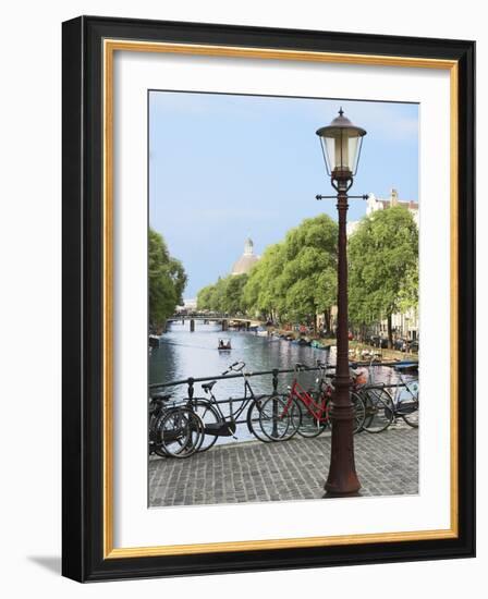 Old Gas Lamp Post and Bicycles on a Bridge over a Canal in Amsterdam, the Netherlands-Miva Stock-Framed Photographic Print