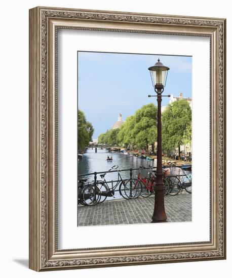 Old Gas Lamp Post and Bicycles on a Bridge over a Canal in Amsterdam, the Netherlands-Miva Stock-Framed Photographic Print