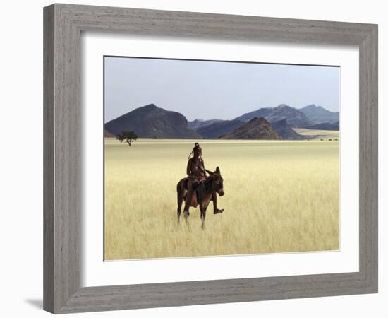 Old Himba Woman, Upright Despite Her Years, Rides Her Donkey Through Harsh Land-Nigel Pavitt-Framed Photographic Print