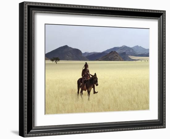 Old Himba Woman, Upright Despite Her Years, Rides Her Donkey Through Harsh Land-Nigel Pavitt-Framed Photographic Print