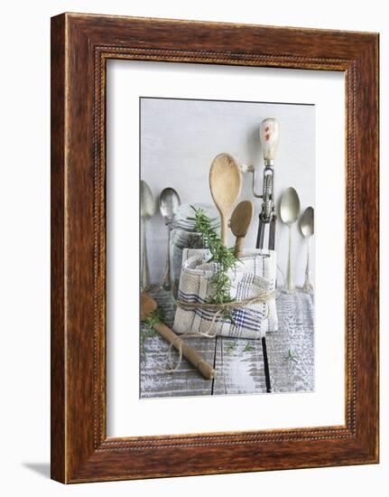 Old Kitchen Utensils: Spoons, Beater, Wooden Spoon and Linen Dish Towel-Martina Schindler-Framed Photographic Print