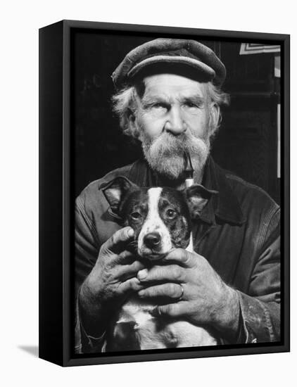 Old Man Holding His Hands around a Dog's Throat-Dmitri Kessel-Framed Premier Image Canvas