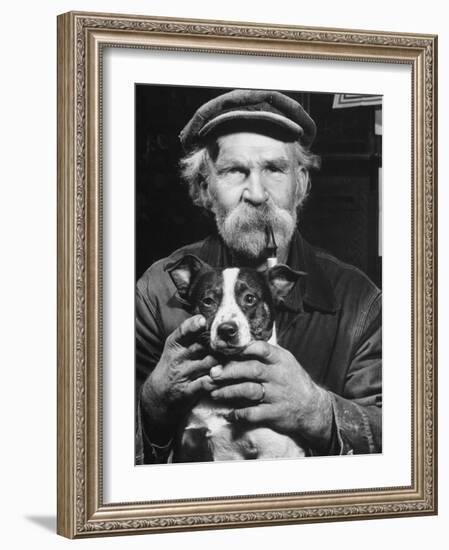 Old Man Holding His Hands around a Dog's Throat-Dmitri Kessel-Framed Photographic Print