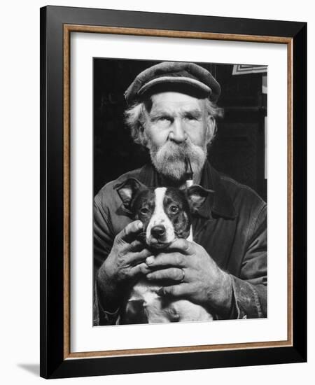 Old Man Holding His Hands around a Dog's Throat-Dmitri Kessel-Framed Photographic Print