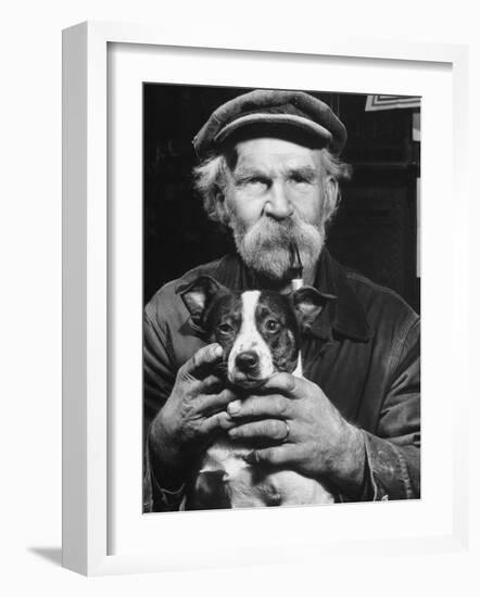 Old Man Holding His Hands around a Dog's Throat-Dmitri Kessel-Framed Photographic Print