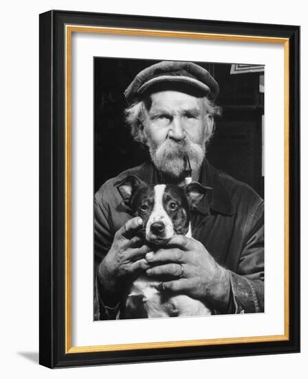 Old Man Holding His Hands around a Dog's Throat-Dmitri Kessel-Framed Photographic Print