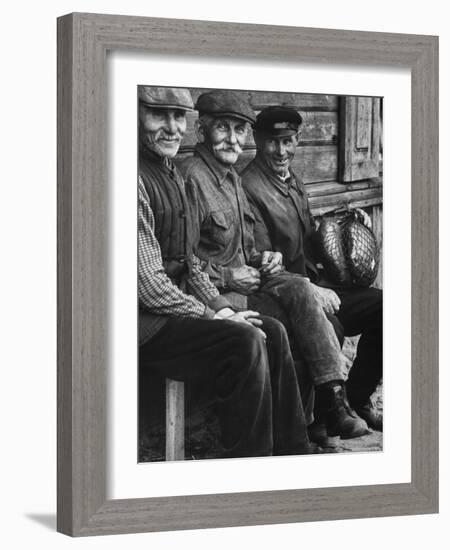 Old Men Smiling, Sitting on Bench, After Waiting in Line For Meat-Paul Schutzer-Framed Photographic Print