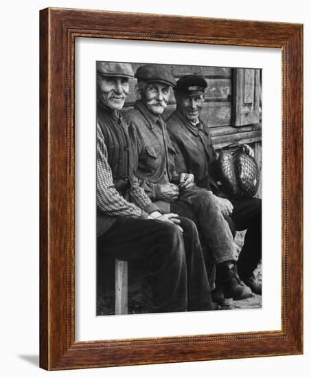 Old Men Smiling, Sitting on Bench, After Waiting in Line For Meat-Paul Schutzer-Framed Photographic Print