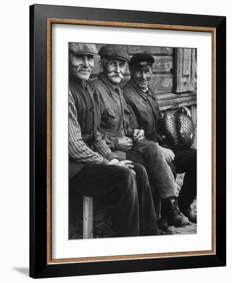 Old Men Smiling, Sitting on Bench, After Waiting in Line For Meat-Paul Schutzer-Framed Photographic Print