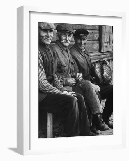 Old Men Smiling, Sitting on Bench, After Waiting in Line For Meat-Paul Schutzer-Framed Photographic Print