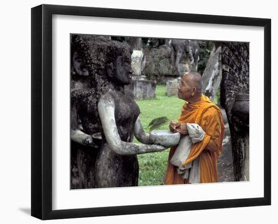 Old Monk Praying at Xieng Khuan (Buddha Park), Laos-Keren Su-Framed Photographic Print