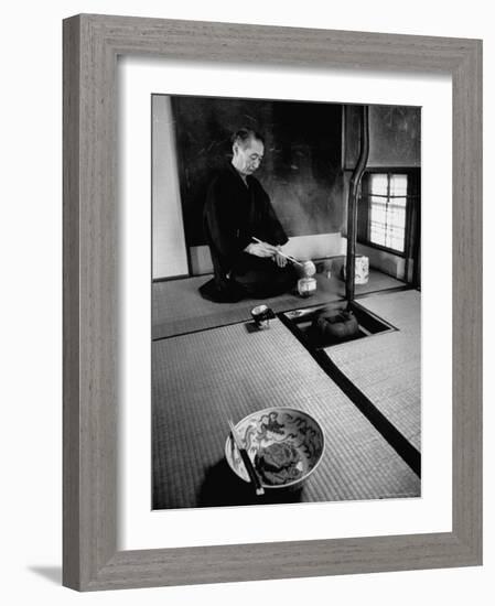 Old Monk Sitting in Cell Meditating and Performing Tea Ceremony-Howard Sochurek-Framed Photographic Print
