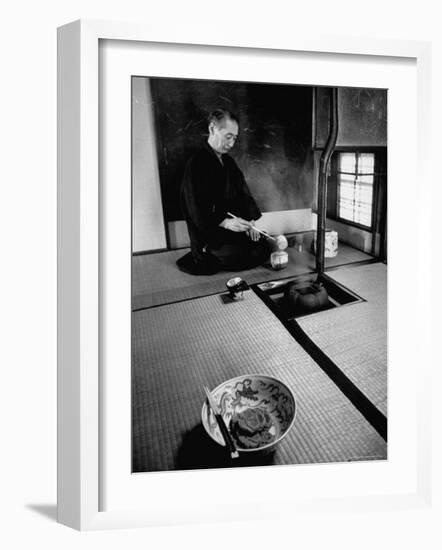 Old Monk Sitting in Cell Meditating and Performing Tea Ceremony-Howard Sochurek-Framed Photographic Print