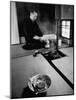 Old Monk Sitting in Cell Meditating and Performing Tea Ceremony-Howard Sochurek-Mounted Photographic Print