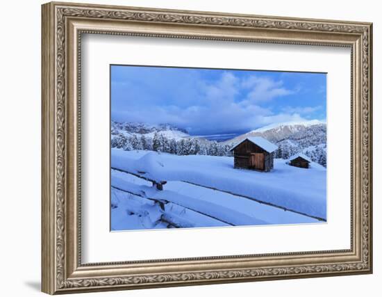 Old snow-covered huts during twilight, Erbe Pass, Funes Valley, Sudtirol (South Tyrol), Dolomites, -Francesco Bergamaschi-Framed Photographic Print