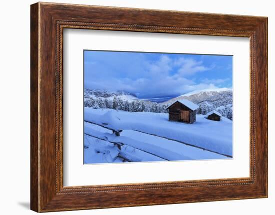 Old snow-covered huts during twilight, Erbe Pass, Funes Valley, Sudtirol (South Tyrol), Dolomites, -Francesco Bergamaschi-Framed Photographic Print